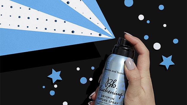 Bb thickening hair spray on a blue, black and white graphic background